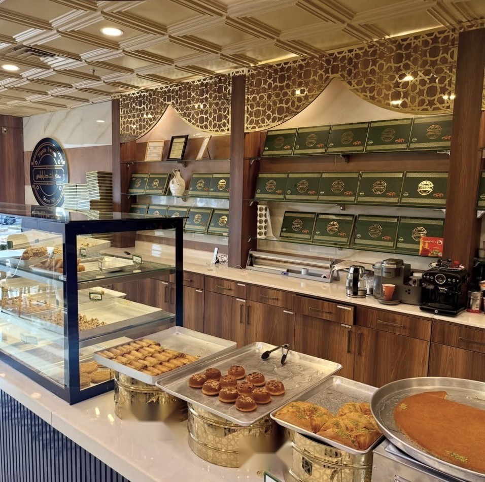 Lebanese pastry display case inside Tripolis Sweets